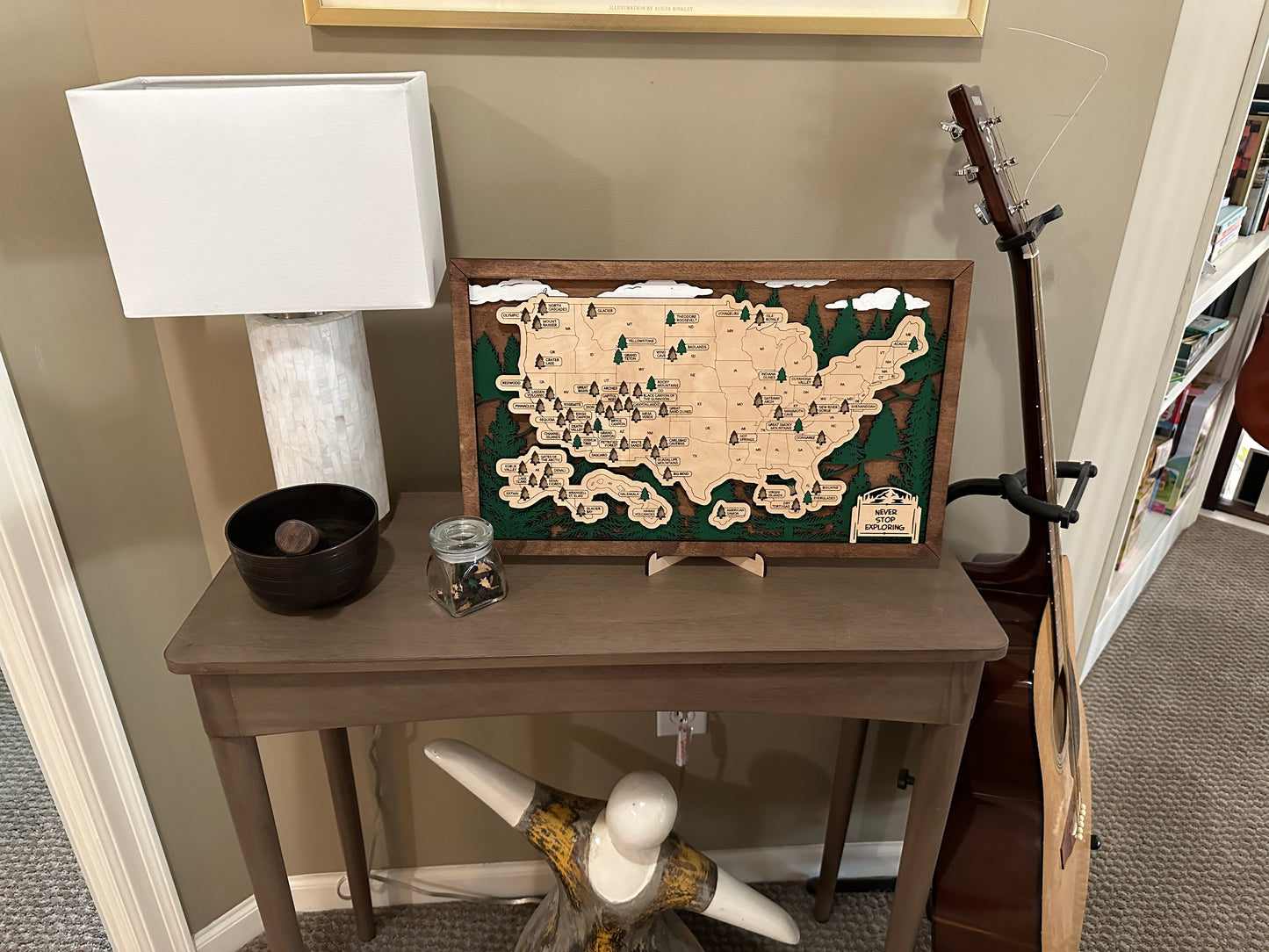 Layered wooden map of the National Parks in the United States including Hawaii and Alaska.